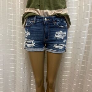 American Eagle next level stretch distressed dark blue denim shorts